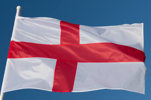 istock English flag waving in wind. 1327715450