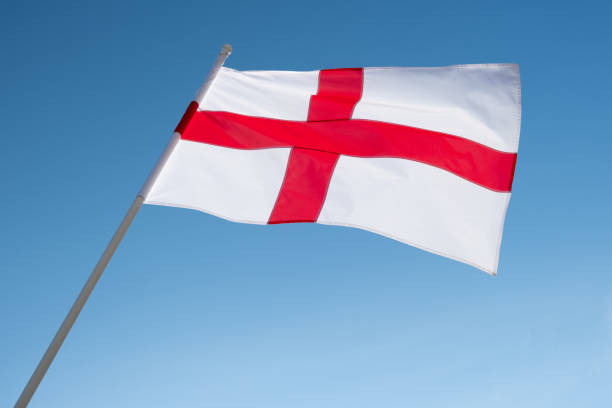 istock English flag waving in wind. 1327715586