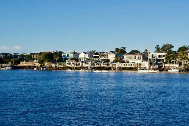 istock Silver sheen in front of waterfront homes Bulimba 1327717889