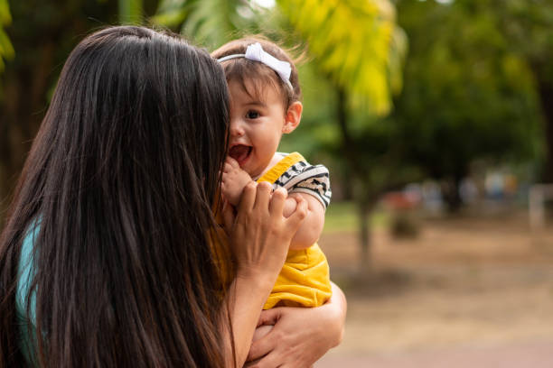 istock Mother holds baby daughter 1327722531