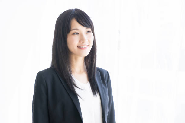istock young attractive asian businesswoman 1327730763