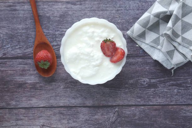 istock fresh strawberry and yogurt in a bowl on table 1327737834