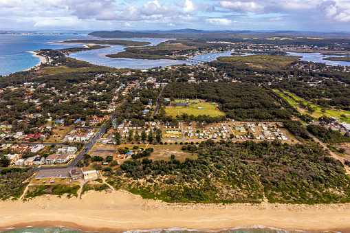 Aerial view of the Coastal town of Hawks Nest with Bennetts Beach, and Tea Gardens near Port Stephens and Nelson Bay