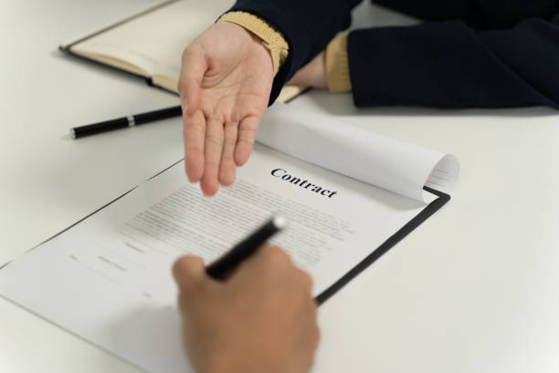 istock Unrecognizable person signing agreement in the contract. 1327745655