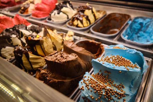 istock Lots of ice creams at showcase fridge display 1327748657