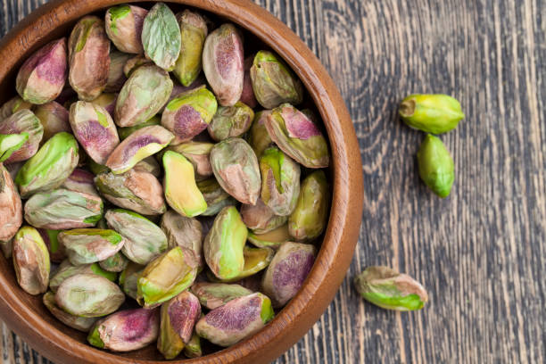 istock delicious and salty pistachio nuts 1327751354