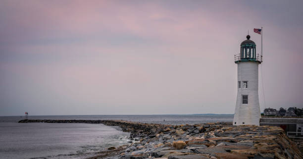 istock Scituate Lighthouse in Scituate, Massachusetts. Historic Landmark Navigational Facility in America. Panoramic Twilight Seascape with Space for Text and Design. 1327752887