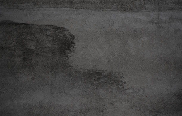 istock Concrete and cement texture. Black mortar plasterer wall background 1327753110