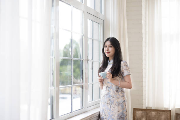 istock girl drinking coffee in a cafe 1327754072