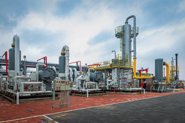 istock Engineers and staff communicate on site in chemical plant 1327757261