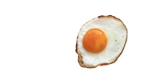 Fried egg isolated on white background stock photo