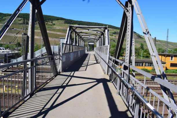 istock iron bridge across a huge railroad 1327764327