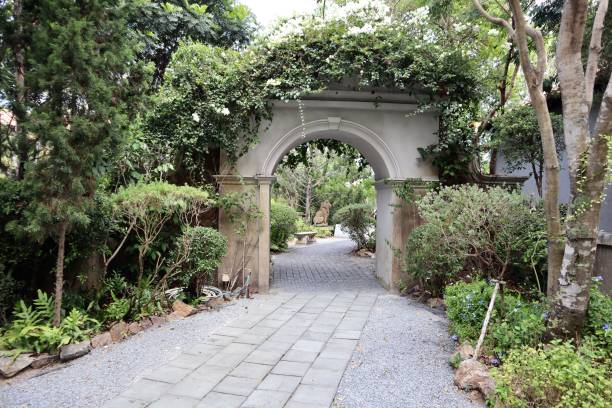 Beautiful garden with arch door decoration stock photo