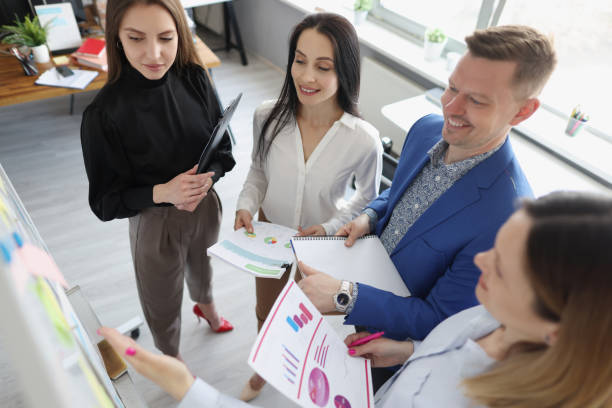istock Managers are trained in business analytics and building marketing plan 1327764502