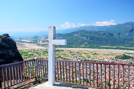 Cross over the town of Kalabaka as seen from Meteora, Greece