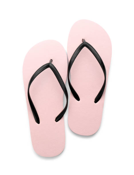 istock Stylish pink flip flops on white background, top view. Beach object 1327766070