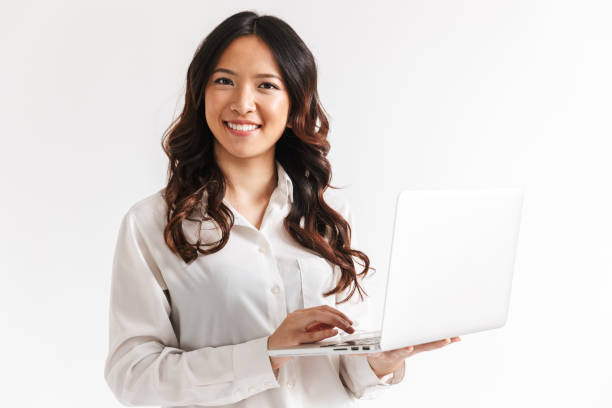 istock Confident young asian businesswoman standing 1327766714
