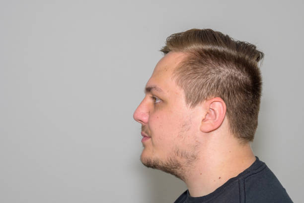istock Profile view of a young man in his twenties 1327768224