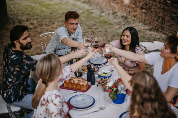 istock Friends on dinner party outdoors 1327769602