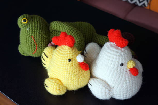 istock handmade crochet animal and chicken doll. wool toy handicraft. 1327770778