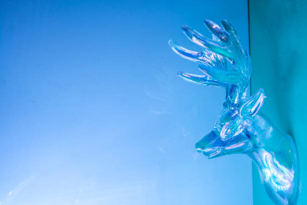 istock Deer head on wall. Neon holographic colors. Concept minimal photo 1327772403