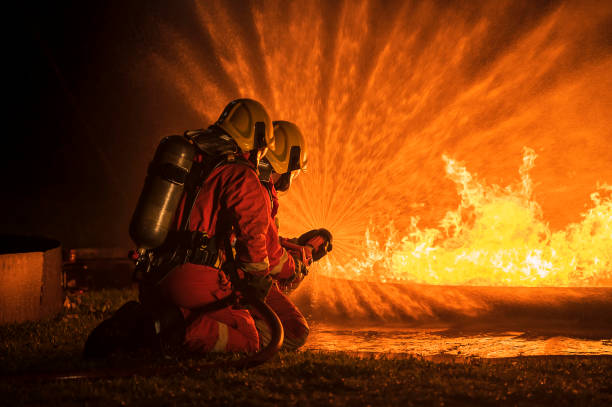 istock Fire drills in the training regularly to get ready to burning car after accident on road 1327773367