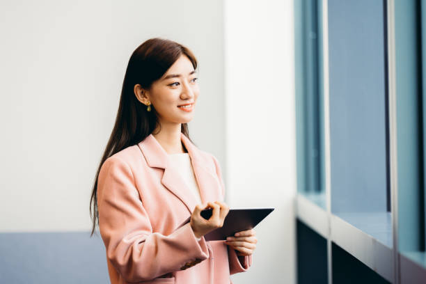 istock Asian businesswoman in office. 1327775397