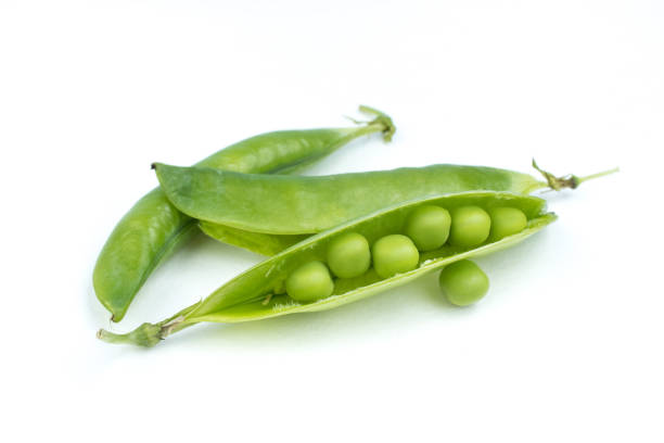 istock Sugar snap peas isolated white background. Vegetable protein. 1327776176
