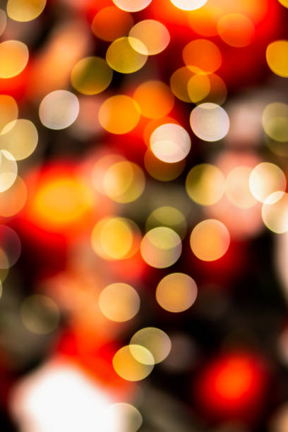 istock Christmas Bokeh background. Blurred Christmas tree light. Happy New Year bokeh background. Winter holidays bokeh texture 1327776266