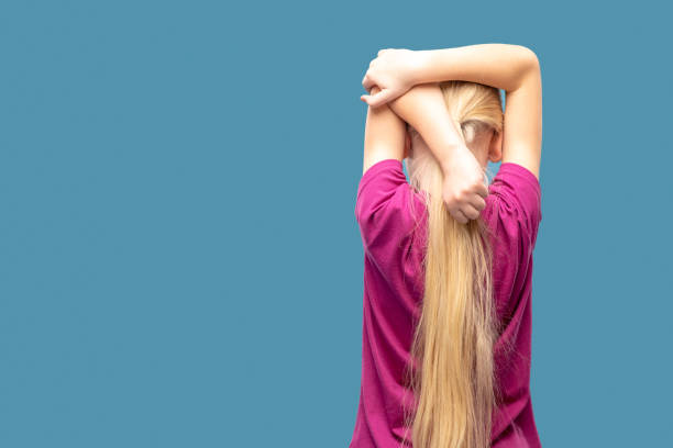 istock Girl doing warmup with back to camera 1327776884