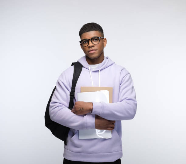 istock Confident male student wearing lilac hoodie 1327785459