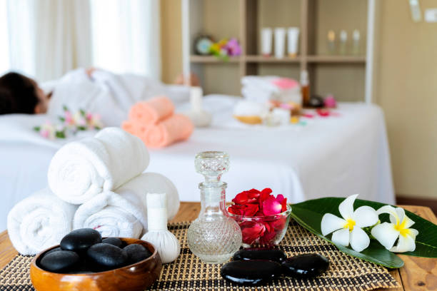 istock Thai massage. Woman receiving back massage, relaxing in spa 1327785721