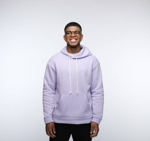 istock Friendly young man wearing lilac hoodie 1327788028