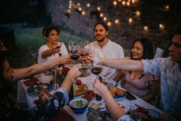 istock Group of friends on dinner party 1327788140