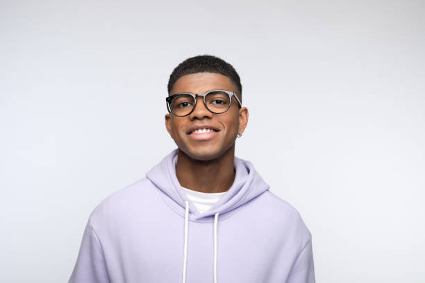 istock Friendly young man wearing lilac hoodie 1327788231