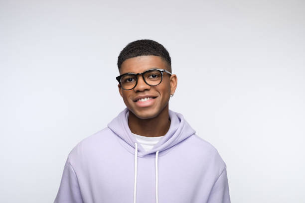 istock Friendly young man wearing lilac hoodie 1327788367