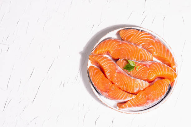 istock Fresh raw salmon or trout fish fillet steaks 1327791069