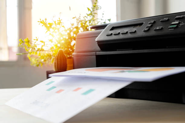 istock The printer is fully functional,Located on the desk. 1327791758