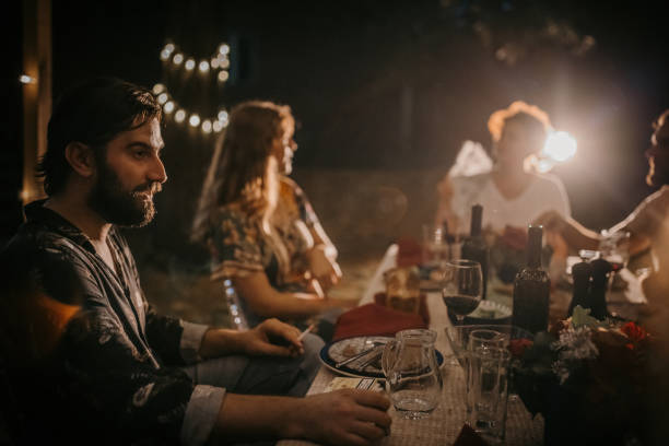 istock Friends on dinner party in back yard 1327794911