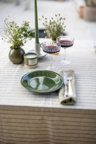 istock Table in the garden is covered with a tablecloth 1327796184