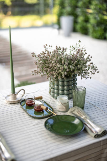 istock Table in the garden is covered with a tablecloth 1327797221