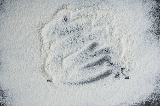 istock Baking background with copy space on black surface for your text. Top view. Flour on a black 1327797252