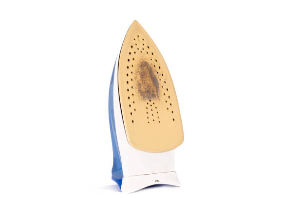 istock Dirty stain on a burnt iron. Cleaning contaminated burned iron. 1327798385