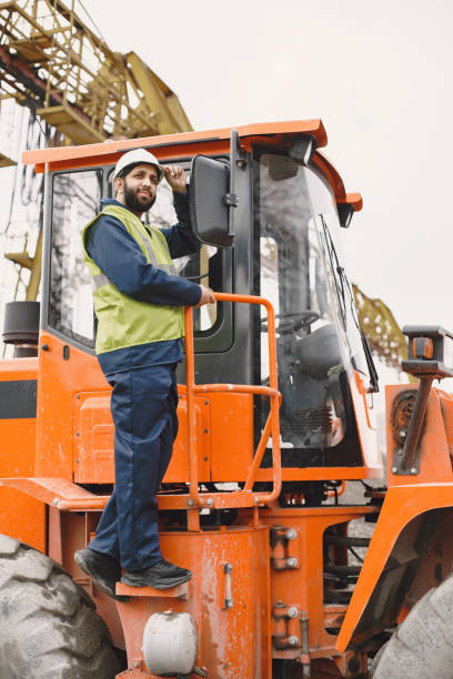 istock Civil engineer working outside with helmet 1327801679