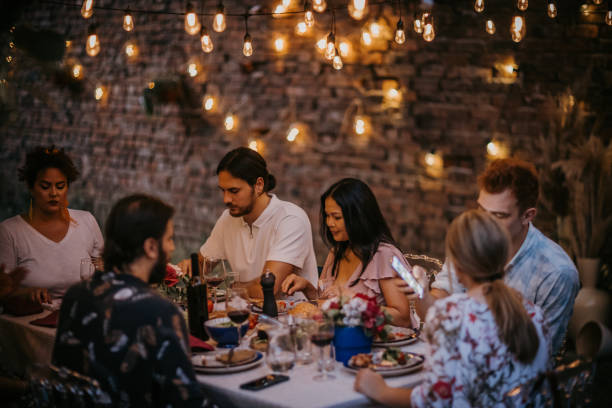 istock Group of friends on dinner party 1327806947