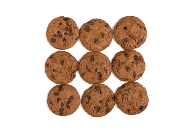 Brown biscuits with a chocolate chips isolated on white background.