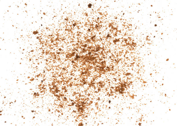 istock Brown biscuits crumbs isolated on white background. 1327810729