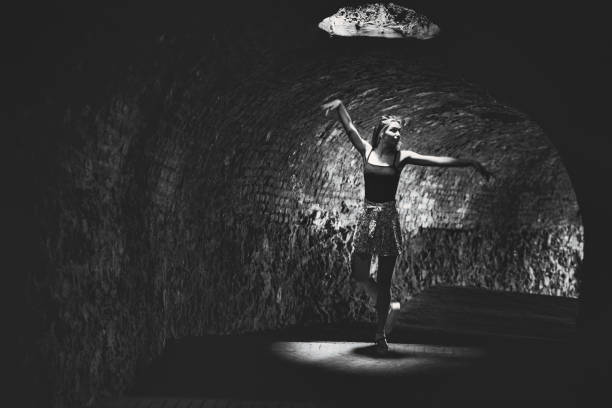 istock Ballerina practicing in a dark tunnel 1327814344