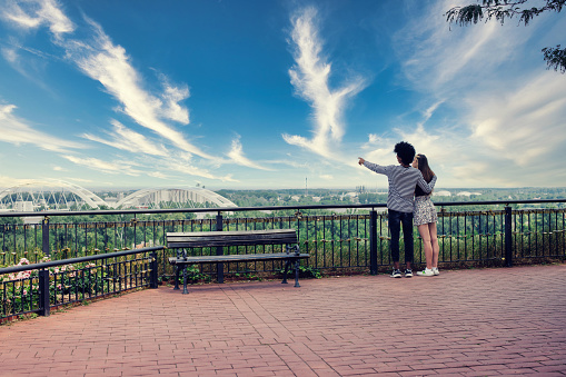 Young couple admiring the city view