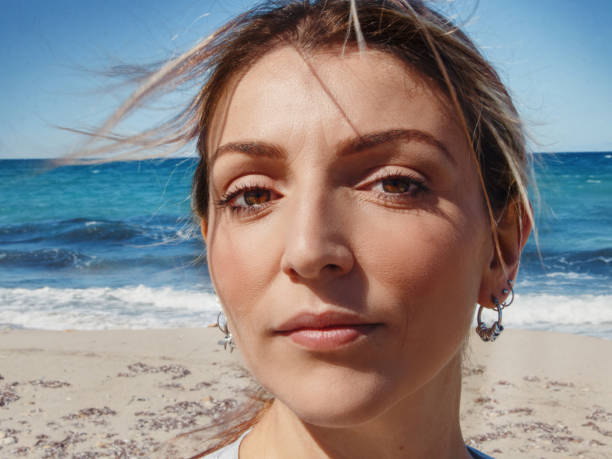 istock Young woman head close up 1327816247